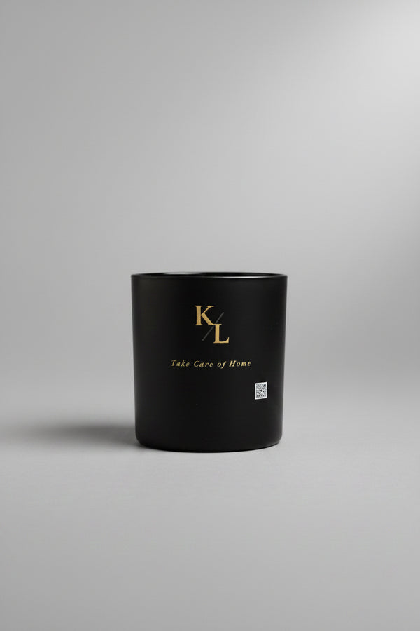 Love Letter from Harlem luxury soy candle in a black matte vessel by Kings & Lotus featuring citrus, cedarwood, musk, and tonka bean fragrance notes.