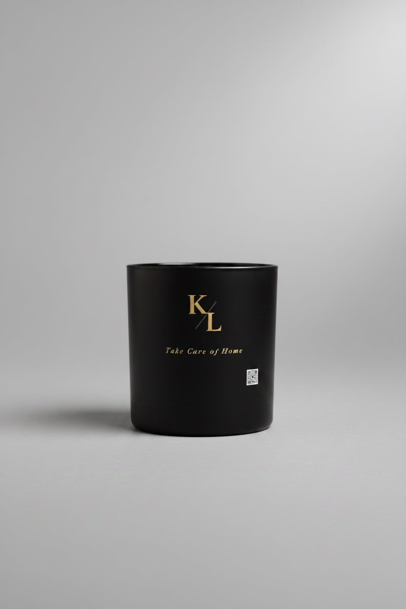 Love Letter from Harlem luxury soy candle in a black matte vessel by Kings & Lotus featuring citrus, cedarwood, musk, and tonka bean fragrance notes.
